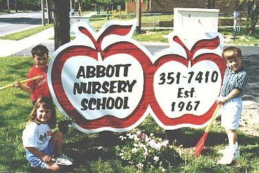 Children around ANS Sign